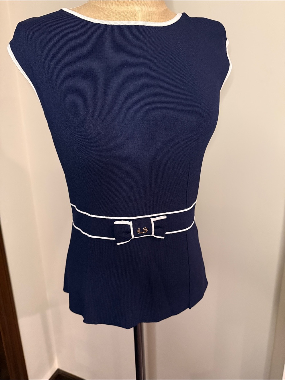 Navy Sleeveless Knit Top with White Trim and Bow Belt